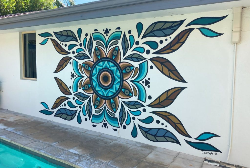 Cool blue geometric pool side mural